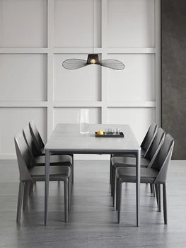 Jednostavan luksuzni dom stol od škriljevca u malom stanu, moderan minimalistički pravokutni stol